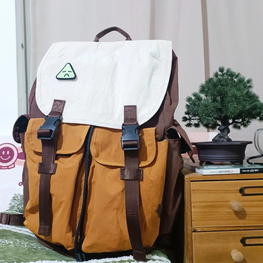 7706 lightweight backpack in home office setting with organized workspace and plants