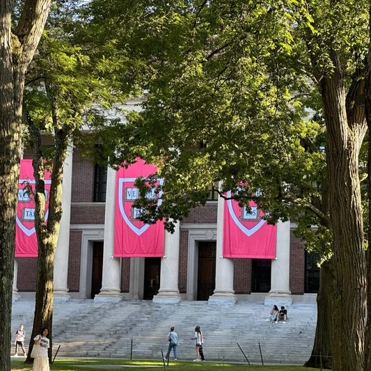 Harvard University campus building with students perfect setting for college backpacks