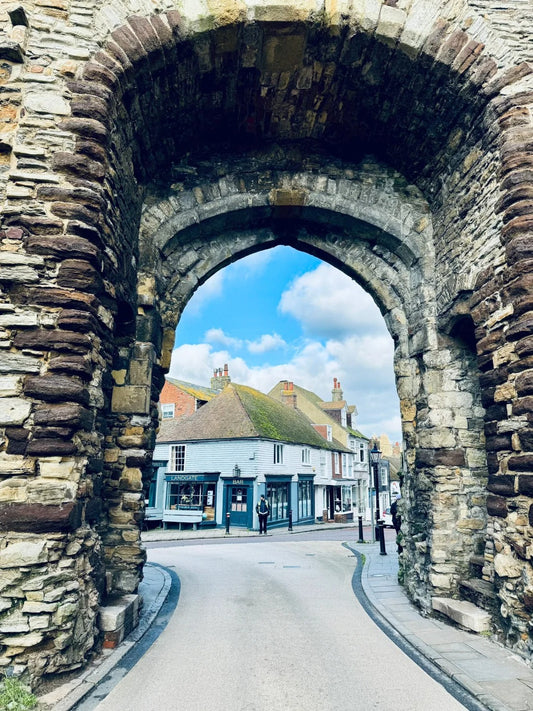 Historic stone arch entrance leading into the village of Rye