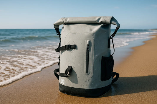 6601 waterproof backpack 20L in black-grey placed on a beach with waves
