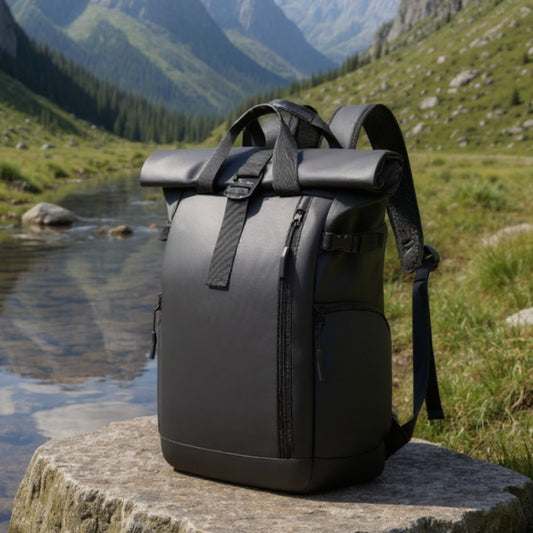 7701 Waterproof Backpack 18L placed on a flat rock by a clear mountain stream, surrounded by green valleys and rugged peaks — perfect for day hikes.