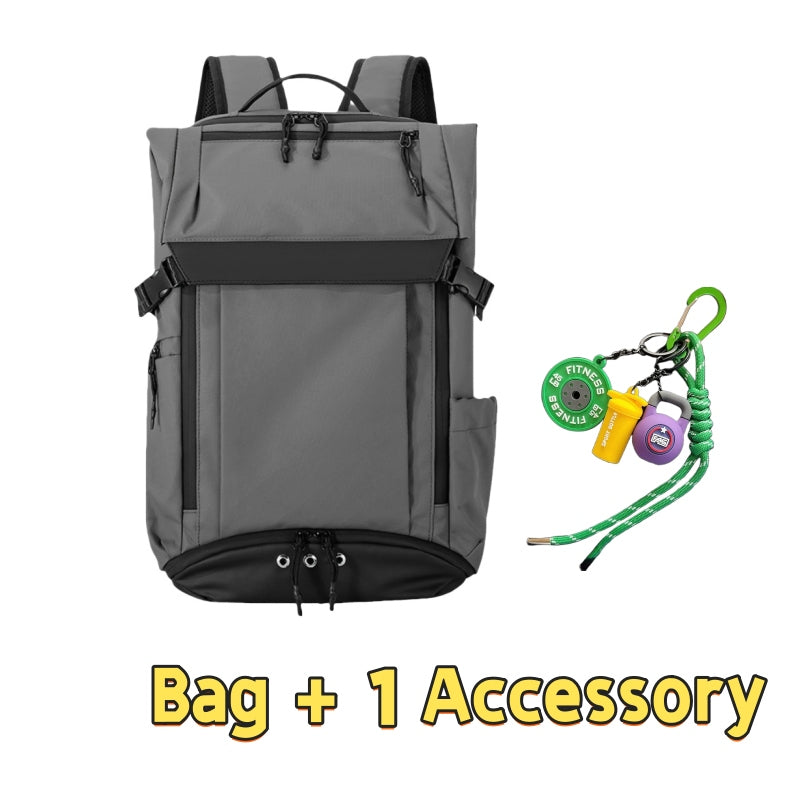 Grey 7702 waterproof backpack 28L showcasing robust outdoor construction, dual-compartment design, external gear loops, compression system and one fitness-themed accessory with green lanyard for outdoor enthusiasts