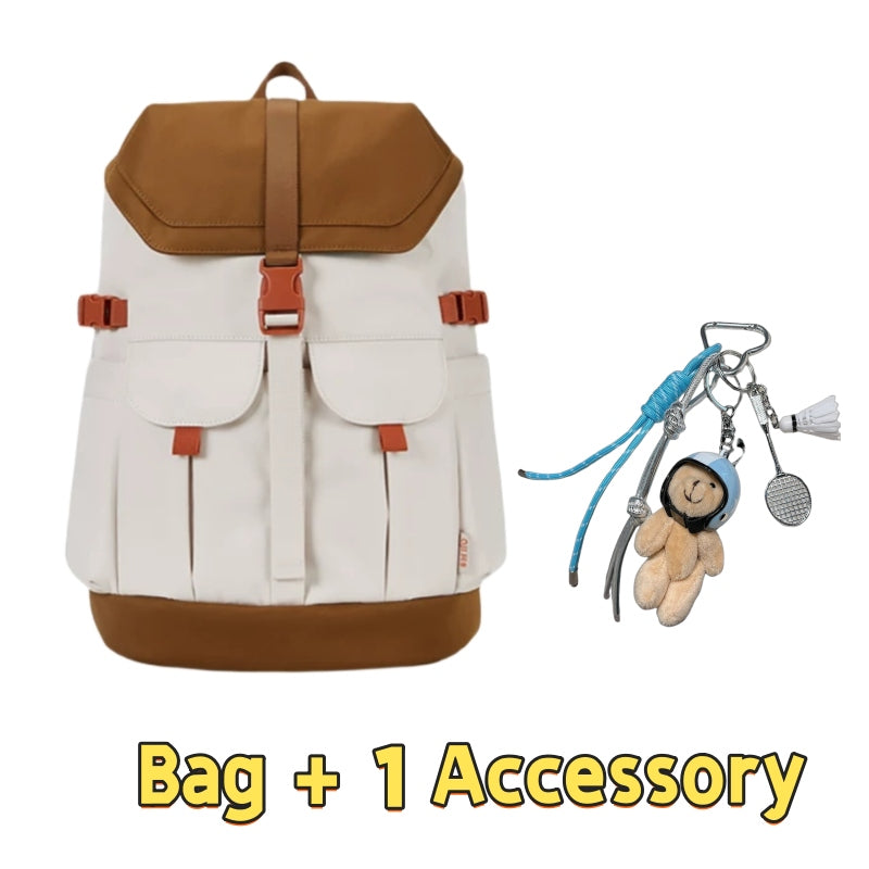 Cream and brown 7708 stylish waterproof backpack 28L featuring vintage-inspired design, dual front pockets, buckle closure system, orange accents and one charming accessory with bear keychain and carabiners