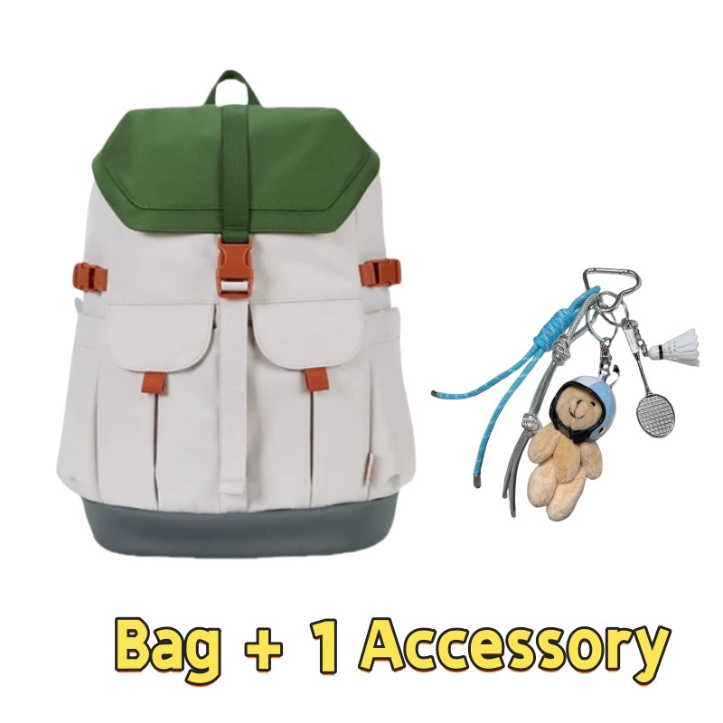 Forest green and cream 7708 stylish waterproof backpack 28L featuring earthy color combination, orange contrast buckles, retro mountaineering style and one accessory with bear charm and outdoor gear