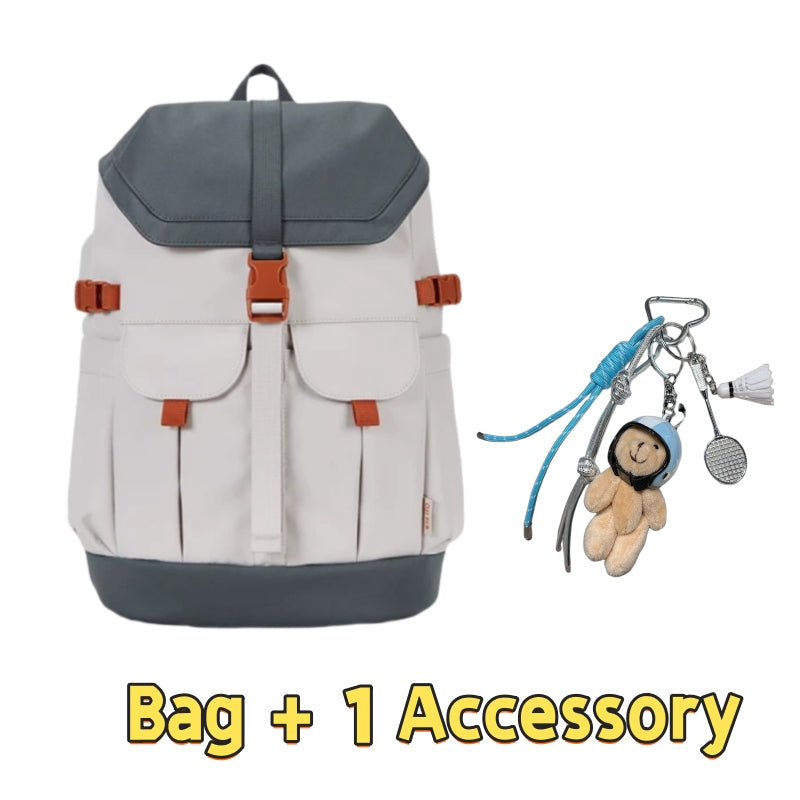 Grey and cream 7708 stylish waterproof backpack 28L with classic color blocking, orange buckle details, vintage-style flap closure and one accessory including adorable bear keychain with survival tools