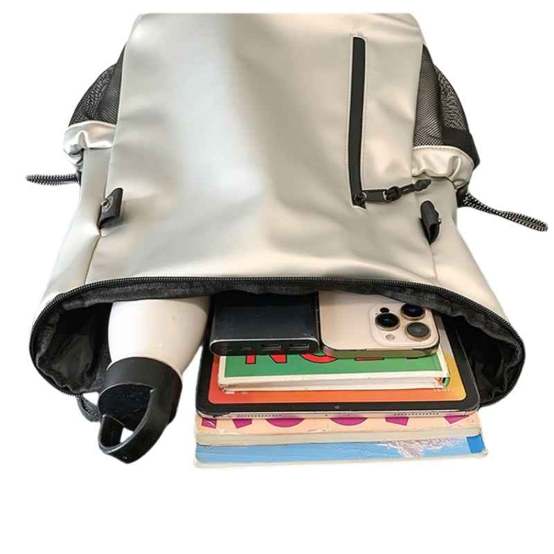 7709 stylish waterproof backpack 20L showing interior capacity with 13-inch laptop, books and daily tech essentials in efficient 20L compact design