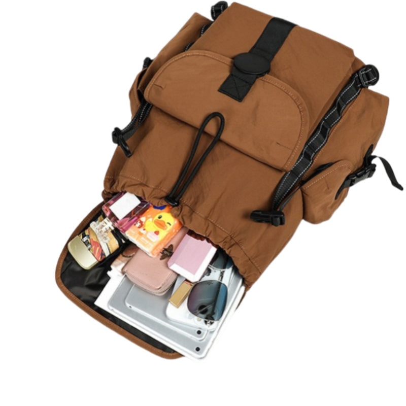 7710 lightweight backpack for travel 22L opened showing 10 organized storage sections with laptop compartment and efficient packing layout