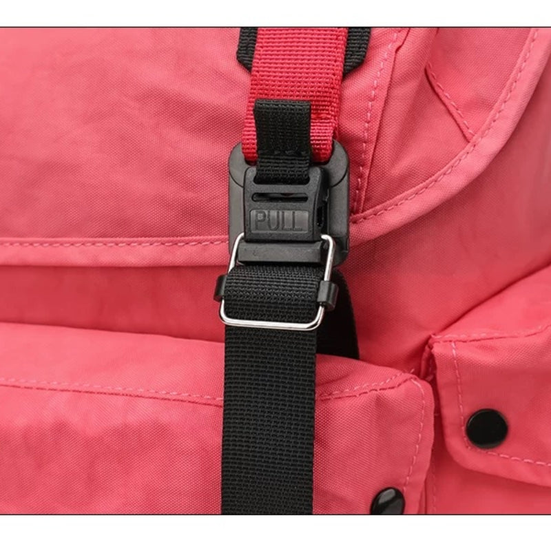 Backpackbeat 7712 Lightweight Backpack quick-release buckle system close-up detail showing easy access design and coral pink material texture