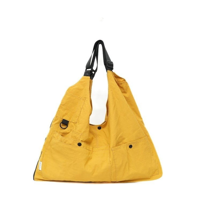 Yellow 9902 Wearable Crossbody Bag, Lightweight Travel Vest Backpack, 8L capacity, vibrant color.