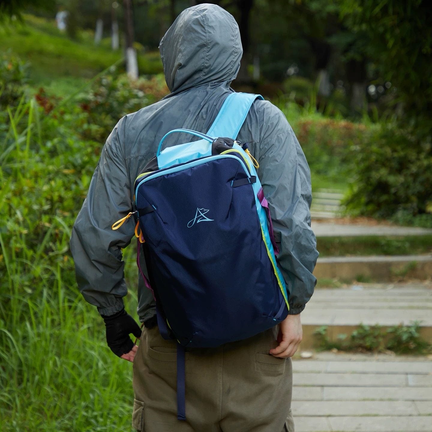 BackpackBeat 8805 lightweight business travel backpack 28L navy blue worn on hiking trail outdoor setting