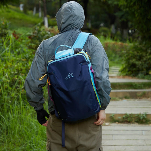 BackpackBeat 8805 lightweight business travel backpack 28L navy blue worn on hiking trail outdoor setting