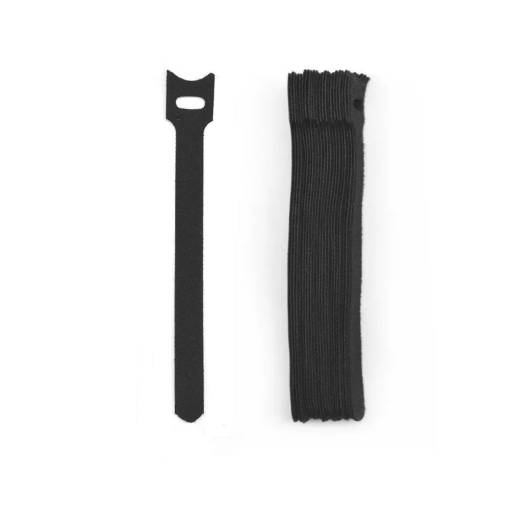 Black reusable velcro cable ties shown individually and as a bundled pack — travel cable management straps for digital nomad gear organization