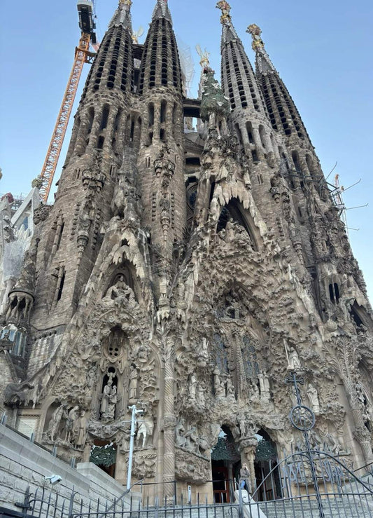 Front view of Sagrada Família with detailed facade and spires