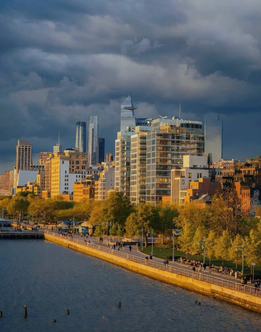 Evening view of Brooklyn Bridge under pink sky at sunset