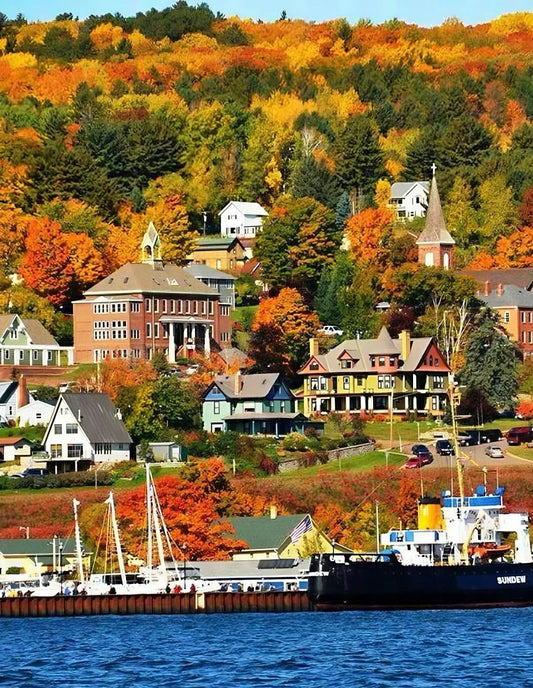 Historic buildings surrounded by autumn leaves on the lakeshore in Port Hope