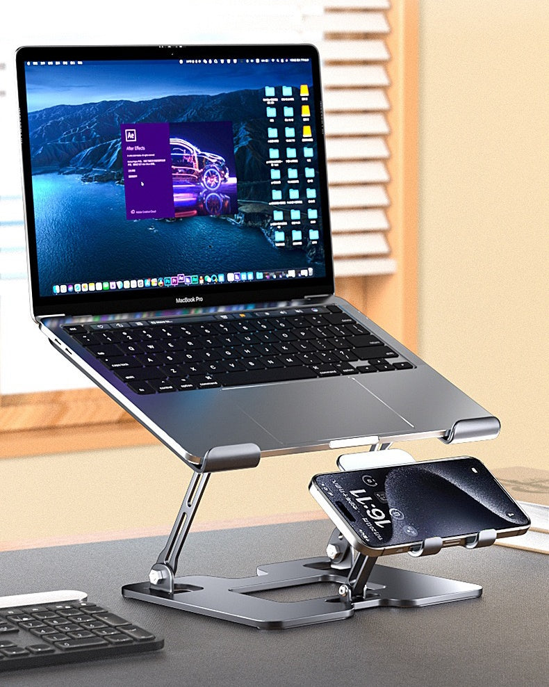 Backpackbeat 1111 laptop stand holding MacBook Pro with phone in integrated holder on desk showing full dual-device remote work setup