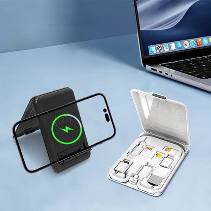 Backpackbeat 1112 phone adapter kit used as wireless charging phone stand alongside MacBook laptop on desk