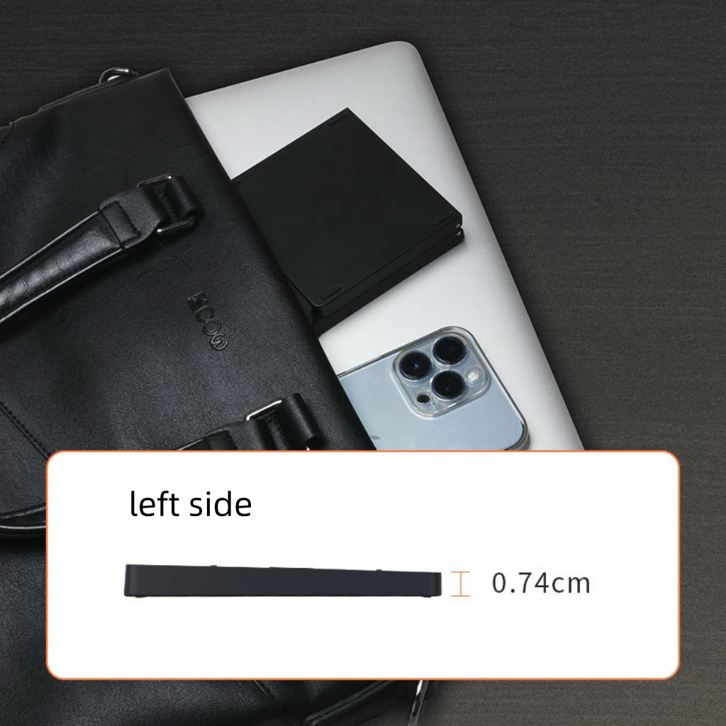 Backpackbeat 1113 foldable Bluetooth keyboard folded to compact size next to bag laptop and phone showing 0.74cm profile