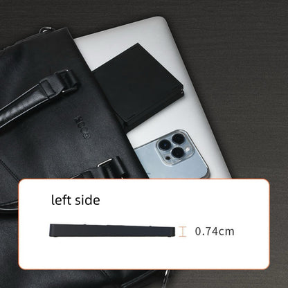 Backpackbeat 1113 foldable Bluetooth keyboard folded to compact size next to bag laptop and phone showing 0.74cm profile