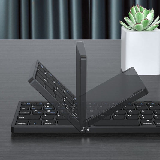 Backpackbeat 1113 foldable Bluetooth keyboard shown at various fold angles on desk with succulent plant