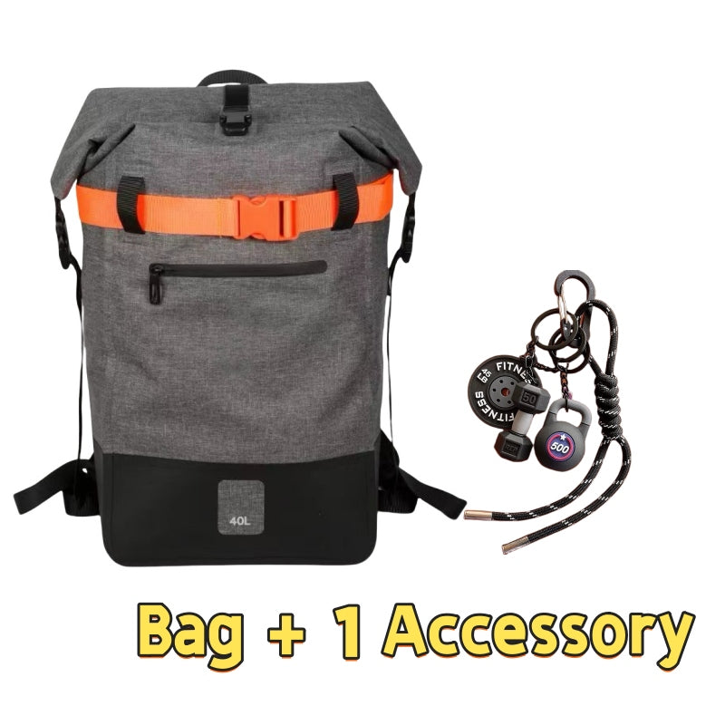 Grey 6600 completely waterproof backpack 40L featuring roll-top dry bag design, bright orange safety belt, front zip pocket, reinforced bottom panel and one fitness accessory with black lanyard and survival tools for extreme water activities