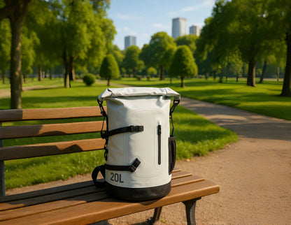 6601 waterproof backpack 20L in light grey placed in an urban park setting