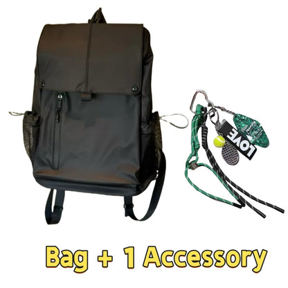 Black 7709 stylish waterproof backpack 20L showcasing sleek flap closure, reinforced construction, dual side pockets with one adventure accessory lanyard for outdoor activities