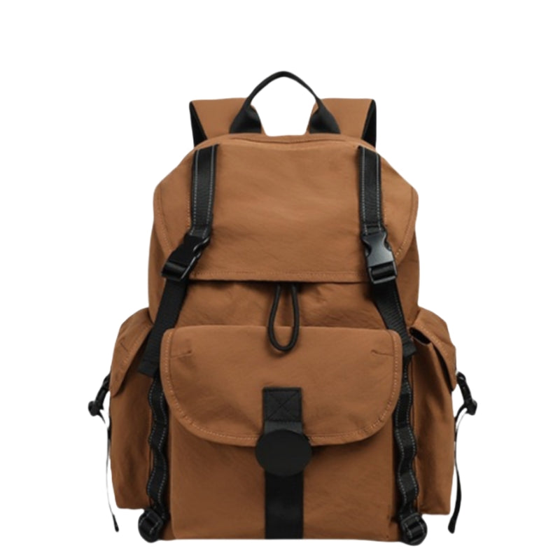 7710 lightweight backpack for travel 22L in brown canvas showing multiple pockets, flap closure and 70mm padded shoulder straps for ultra-light comfort