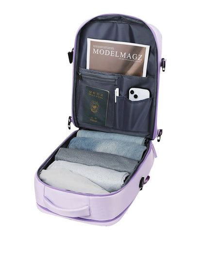 Purple 8802 travel backpack 35L fully opened showing organized interior compartments with magazine, passport, phone, and folded clothes demonstrating efficient packing system