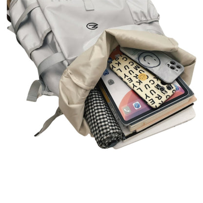 Beige 8803 waterproof backpack 34L with side compartment open showing tablet, books, and personal items organization with portable insertion pockets
