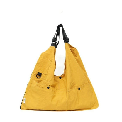 Yellow 9902 Wearable Crossbody Bag, Lightweight Travel Vest Backpack, 8L capacity, vibrant color.