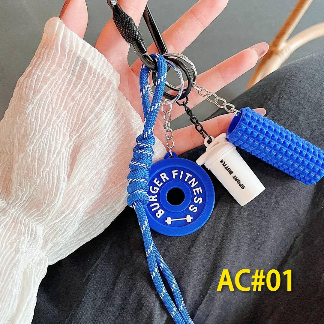 Blue fitness gear keychain set AC#01 featuring BURGER FITNESS weight plate charm, textured foam roller, and braided lanyard - premium workout accessories for gym enthusiasts