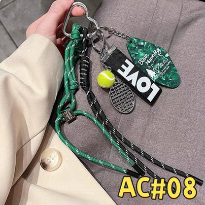 Green and black tennis-themed keychain AC#08 with LOVE tag, tennis ball, racket charm, and dual-color braided cord with carabiner clip