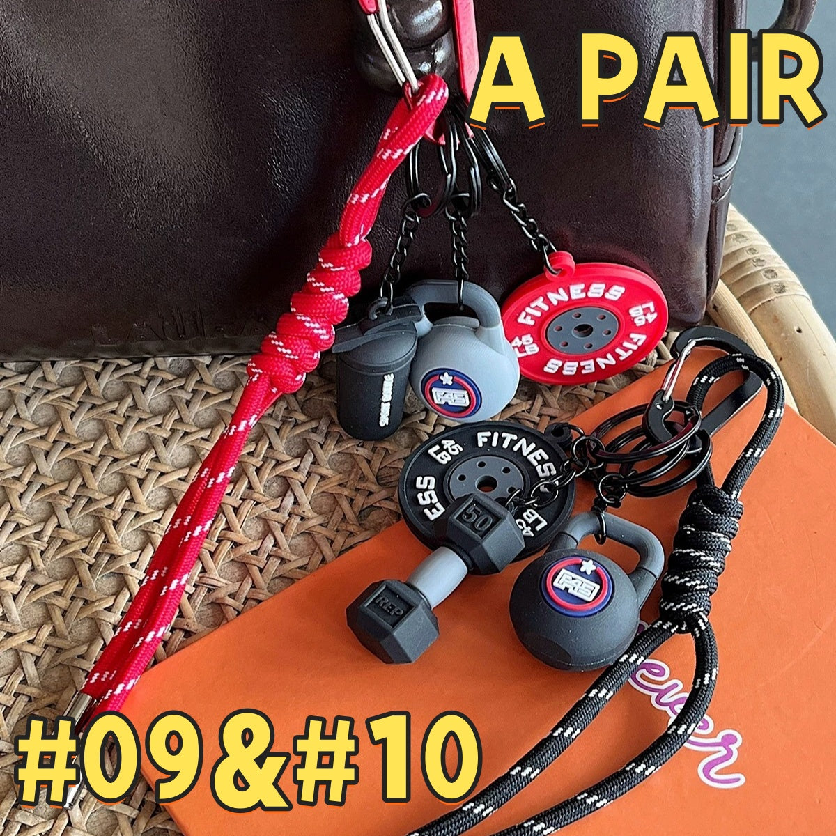 Matching fitness keychain pair AC#09 and AC#10 in black and red, featuring EG FITNESS weight plates, kettlebells, and Sport Bottle tags