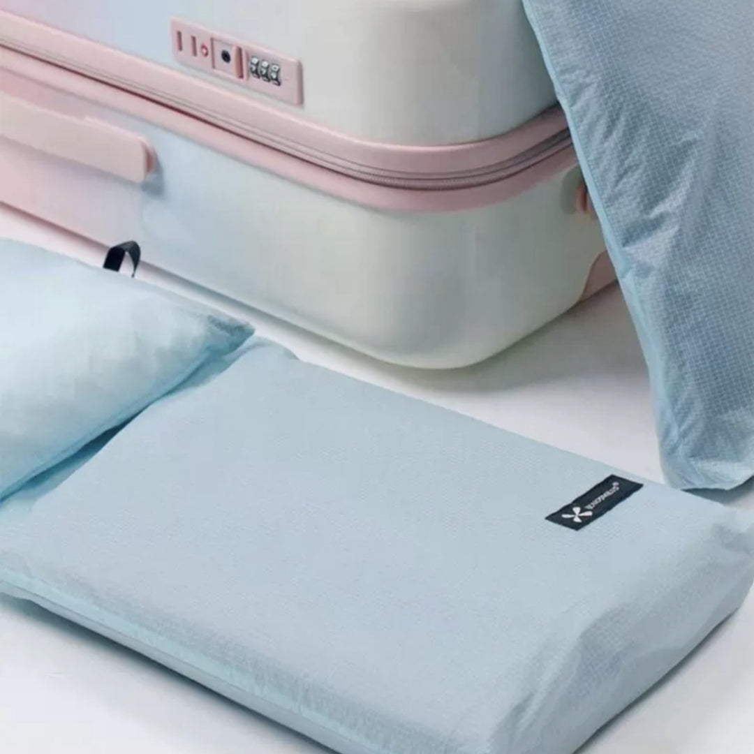 BackpackBeat waterproof wet dry bag laid flat beside suitcase highlighting ultralight and packable material