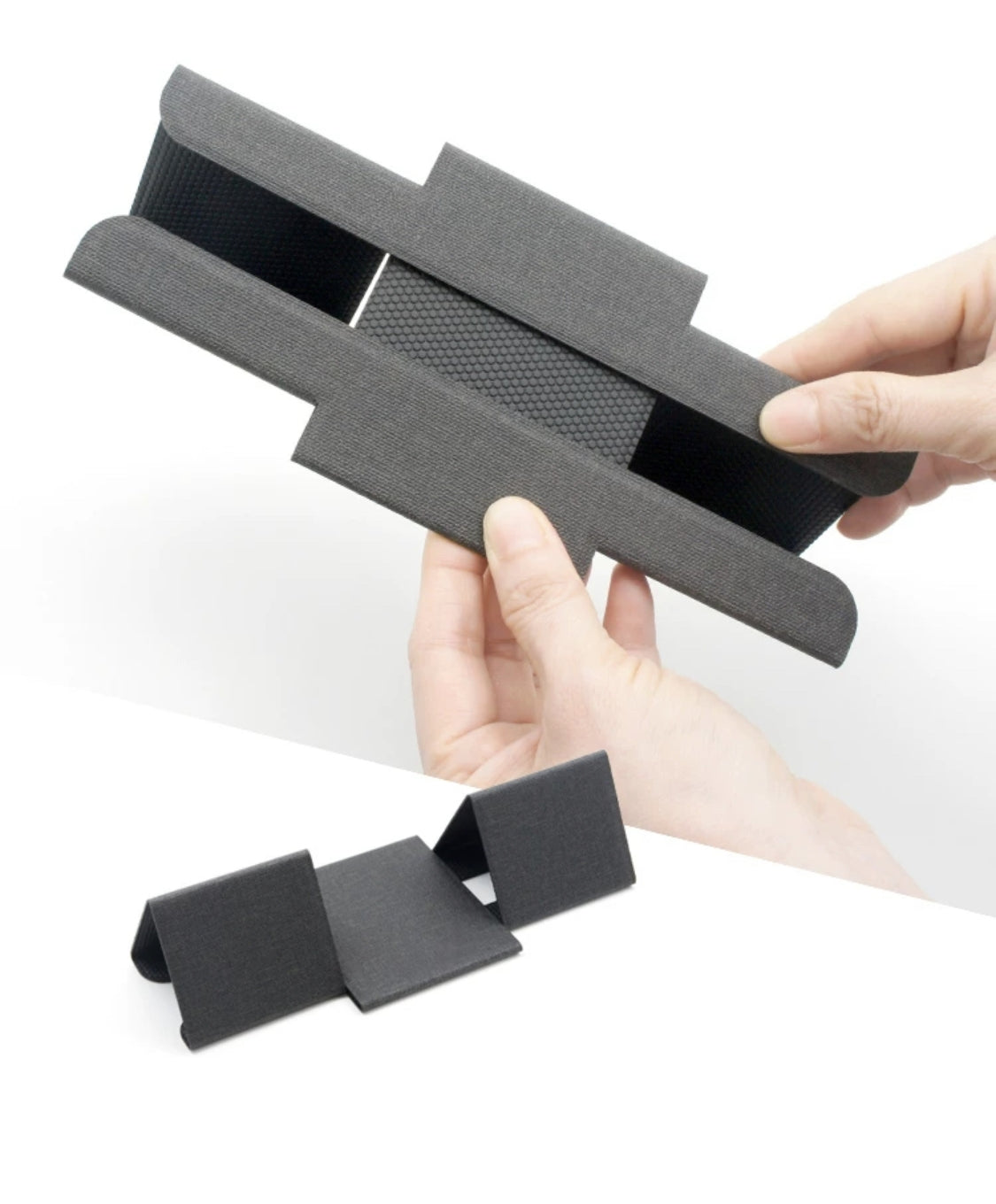 Hands unfolding BackpackBeat 1103 laptop stand from flat to stable triangle position in one motion