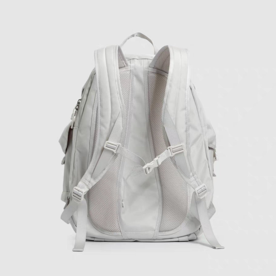 Back view of gray hiking backpack showing breathable mesh panel and padded shoulder straps for comfort