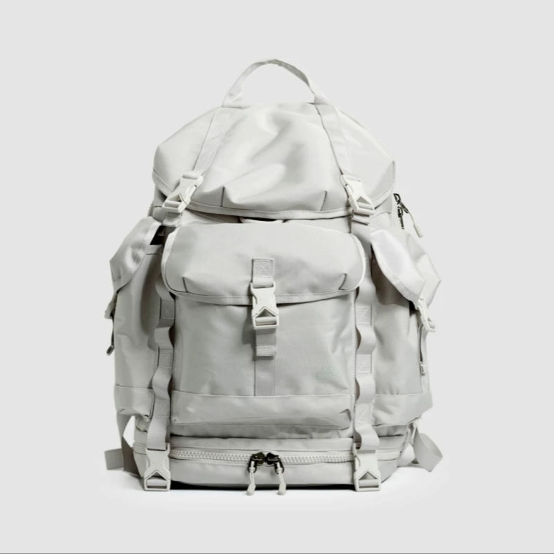 Gray lightweight hiking backpack studio photography displaying professional outdoor gear design