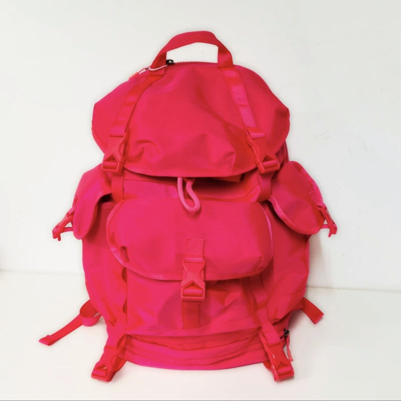 Bright pink 40L lightweight hiking backpack with multiple pockets and outdoor adventure design