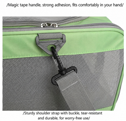 Close-up of p808 green pet carrier showing padded magic tape carry handle and sturdy grey shoulder strap with buckle clip attachment
