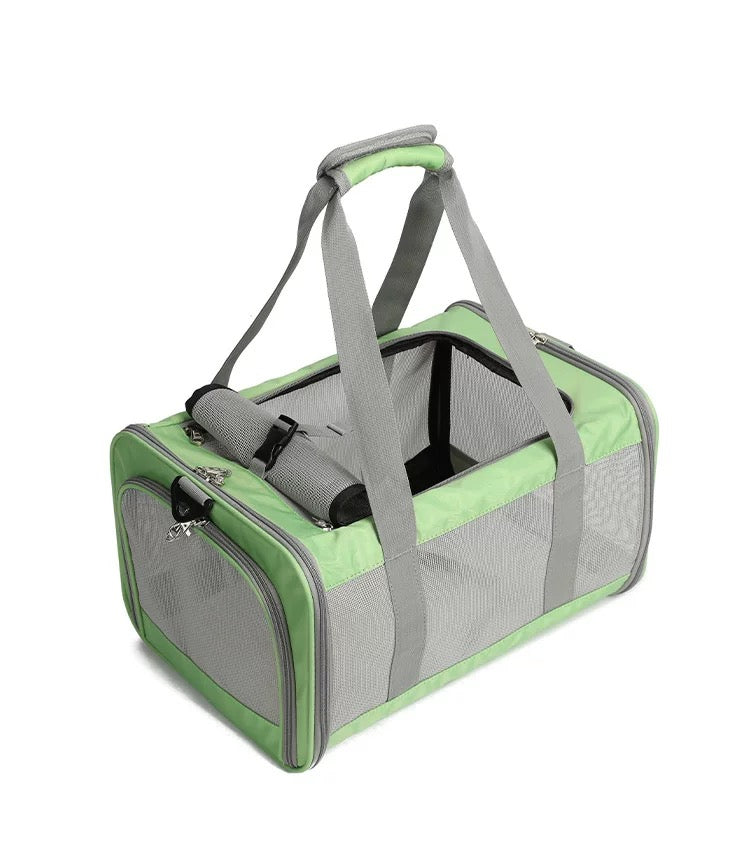 Close-up of p808 green pet carrier showing top roll-up mesh window secured with buckle strap for top-hand access and ventilation