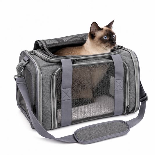 Siamese cat sitting in the open top of the grey P8113 under-seat pet carrier, with mesh front panel, carry handles and padded shoulder strap