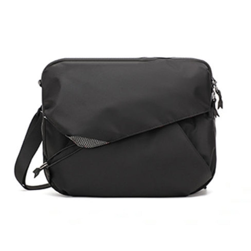 Front view of Backpackbeat 9900 crossbody backpack in black color on white background